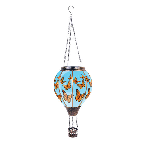 Butterflies Solar Balloon Lantern, blue with orange butterflies, hanging by metal chains, solar powered decoration.