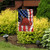 Briarwood Lane Fireman Helmet Garden Flag with American stars and stripes and red firefighter helmet.