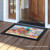 Briarwood Lane Dog Days of Summer nautical doormat with colorful puppy by surf umbrella on sand.