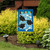 Briarwood Lane Graduation Celebration Garden Flag with colorful congratulatory design on a small decorative yard display.
