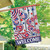 Briarwood Lane patriotic house flag with red, white, and blue flip flops and stars.