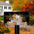 Briarwood Lane Fall Bushel Primitive Mailbox Cover with pumpkins and floral design on tin bucket.
