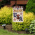 Briarwood Lane patriotic garden flag reads Bless The USA with stars and stripes in red, white, blue.