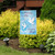Briarwood Lane In Memory Of A Life garden flag with doves on a decorative yard display.