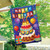 Briarwood Lane colorful birthday house flag with happy birthday cake and balloons on a porch.