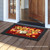 Briarwood Lane Fall Beauty Floral doormat with colorful flowers, sunflowers, pumpkins on a porch.