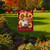 Briarwood Lane Fall Beauty Floral Garden Flag with colorful autumn pumpkins and flowers on a lawn.