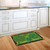 Briarwood Lane Saint Patty's Day small printed doormat with gold shamrock design on green background.