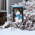 Briarwood Lane Jolly Winter Snowman Garden Flag with snowflake design on a snowy porch display stand.