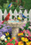 Briarwood Lane Spring Garden Friends House Flag with colorful birds and flowers on decorative stone birdbath.