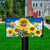 Briarwood Lane Sunflowers and Bees summer mailbox cover with colorful, printed, decorative design on lawn.