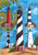 Briarwood Lane Lighthouses Summer Garden Flag with colorful lighthouses on a bright sunny shore display.