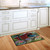 Briarwood Lane small printed doormat with colorful bridge and spring scene on kitchen floor.