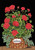 Briarwood Lane Welcome Geraniums small printed garden flag with colorful flowers on a woven basket pot.
