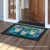 Briarwood Lane small printed doormat with colorful spring saying and candle design on porch.
