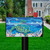 Briarwood Lane colorful sea turtle mailbox cover on a lawn with ocean-inspired decorative design elements.