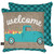Briarwood Lane Springtime Pickup decorative outdoor accent pillow with teal truck and colorful flowers design.