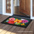 Briarwood Lane Garden Gerber Daisies small printed doormat with colorful springtime flowers and butterflies design.