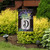 Briarwood Lane Farmhouse Monogram Letter D Garden Flag with colorful flowers on a small decorative yard display.