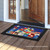 Briarwood Lane Red White and Blue Patriotic Doormat with floral arrangement and american flag design indoor/outdoor.