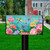 Briarwood Lane Dragonfly Garden Spring Mailbox Cover with colorful flowers and dragonflies on a lawn.