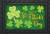 Briarwood Lane Lucky Shamrocks Doormat with gold St. Patrick's Day text and green shamrocks.