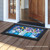 Briarwood Lane small printed doormat with colorful butterflies and pansies for springtime home decor display.