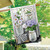 Briarwood Lane checkered mason jars house flag with colorful flowers and daisies on a spring porch.
