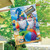 Briarwood Lane Summer Gnomes Humor House Flag with gnomes on beach with umbrella and sun.
