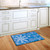 Briarwood Lane small printed decorative doormat with let it snow design on blue background.