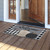 Briarwood Lane Patterned Pumpkins Fall Natural Fiber Coir Doormat, 18 x 30, on wooden porch.