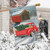 Briarwood Lane festive house flag with red pickup truck and covered bridge winter scene design.