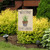 Briarwood Lane small printed garden flag with colorful spring design on a decorative yard display pole.