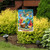 Briarwood Lane 5 O'Clock Cocktails garden flag with colorful summer design and umbrella on sand.