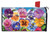 Briarwood Lane Pansies Spring Mailbox Cover with colorful pansy flowers on a blue background.