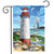 Briarwood Lane Coastal Lighthouse garden flag with sailboat, seagulls, and sunny ocean shore scene.