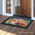 Briarwood Lane Bunnies And Basket Easter doormat on a porch with colorful springtime design.