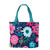 Briarwood Lane bright floral spring canvas tote bag with colorful printed flowers and teal handles.