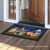 Briarwood Lane Halloween Gnomes Humor doormat on wooden porch with pumpkin and gnome design.