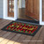 Briarwood Lane small printed Christmas doormat with colorful, cheery holiday design on porch floor.