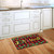 Briarwood Lane small printed Christmas doormat with colorful, cheery "Joy To The World" holiday greeting.