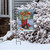 Briarwood Lane Winter Boots Garden Flag with colorful, cheery winter design on a snowy porch display.