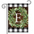 Briarwood Lane monogrammed garden flag with greenery wreath on plaid background for farmhouse porch decor.