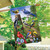 Briarwood Lane spring house flag with colorful birds, flowers, and tree on a decorative printed fabric.