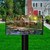 Briarwood Lane Coastal Flowers Summer Mailbox Cover with colorful floral nautical design on a lawn.