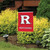 Briarwood Lane Rutgers University NCAA Licensed garden flag on decorative yard display pole near bushes.