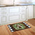 Briarwood Lane monogrammed doormat with black and white checkered border and fall wreath design insert.