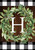 Briarwood Lane monogrammed wreath with greenery and letter H on checkered background, colorful decorative house decor.