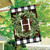 Briarwood Lane double-sided house flag with monogrammed greenery wreath on plaid background for porch display.