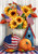 Briarwood Lane Americana Autumn Garden Flag with sunflowers, pumpkins, and patriotic decor on plaid background.